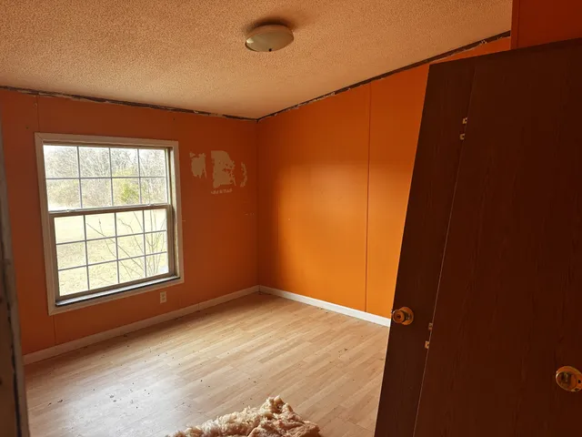 an empty room with windows