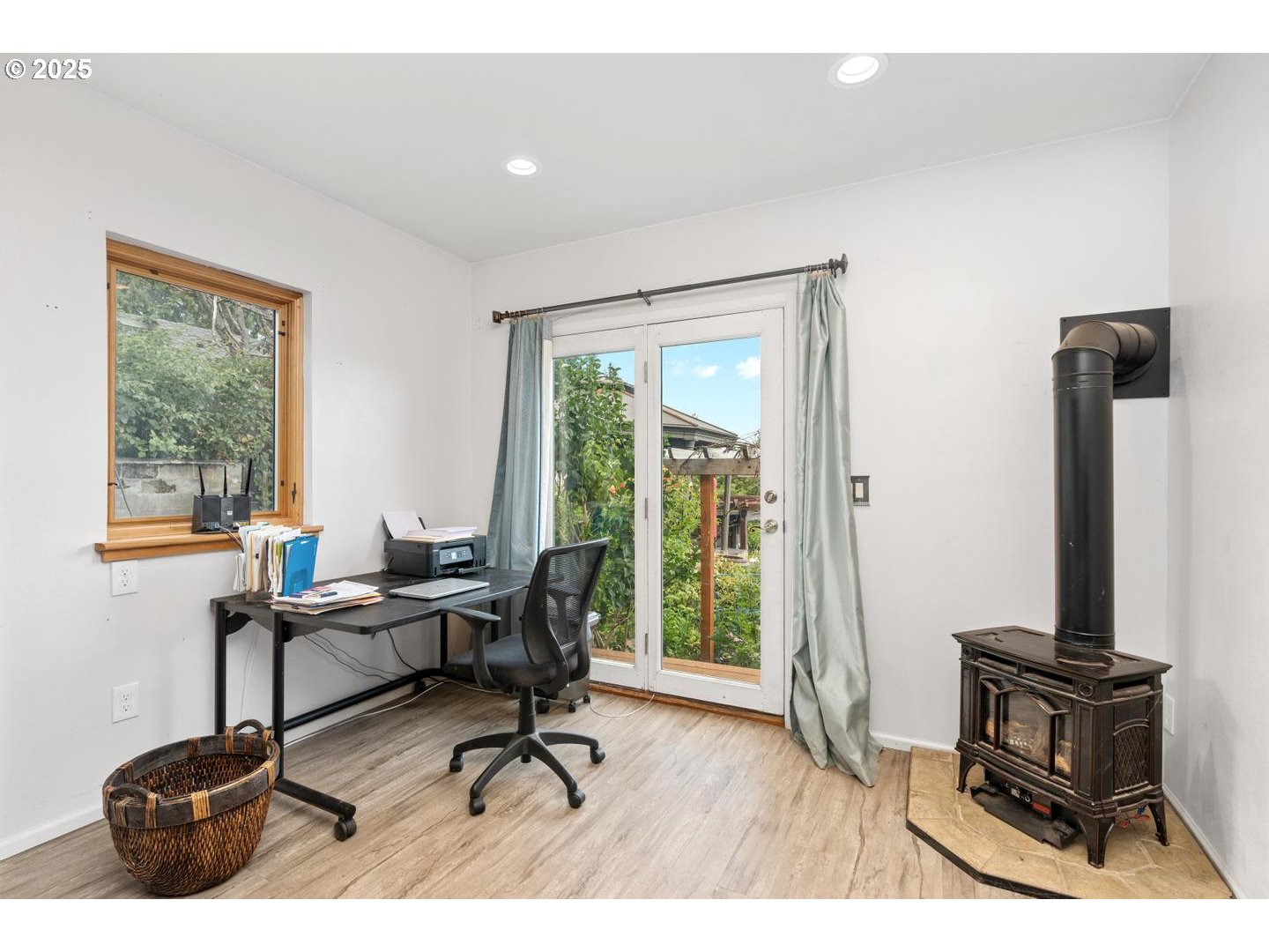 8970 Southeast Kingswood Way Damascus, OR 97089 - Photo 12 of 42 a view of a workspace with furniture and a window