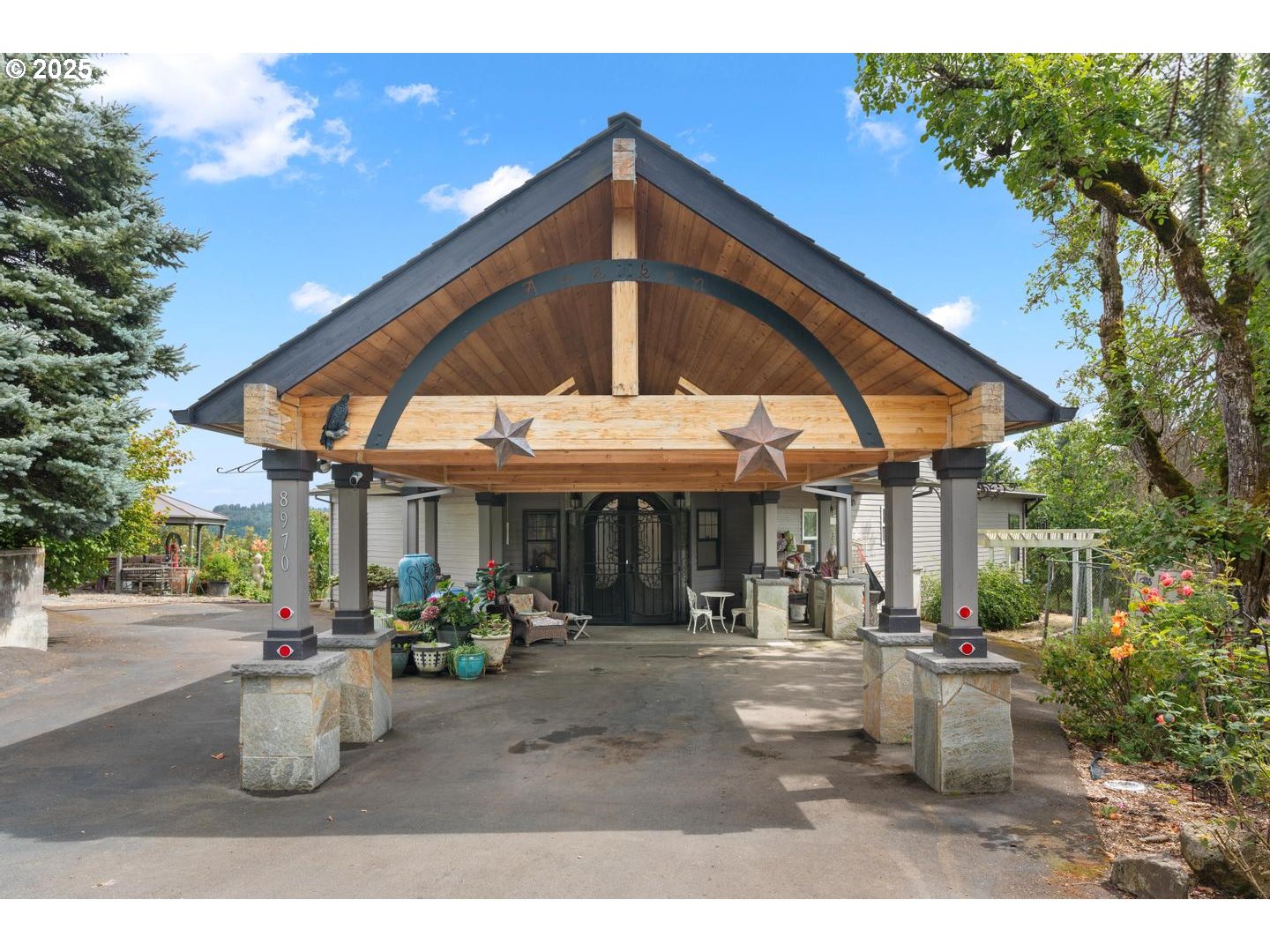 8970 Southeast Kingswood Way Damascus, OR 97089 - Photo 2 of 42 a view of outdoor space and porch