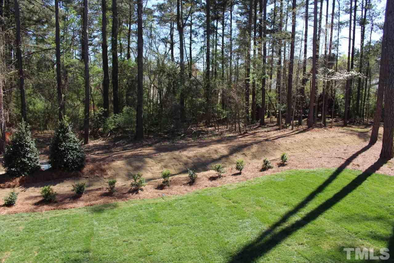 6120 Ponderosa Road Raleigh, NC 27612 - Photo 25 of 25 a view of a backyard with garden
