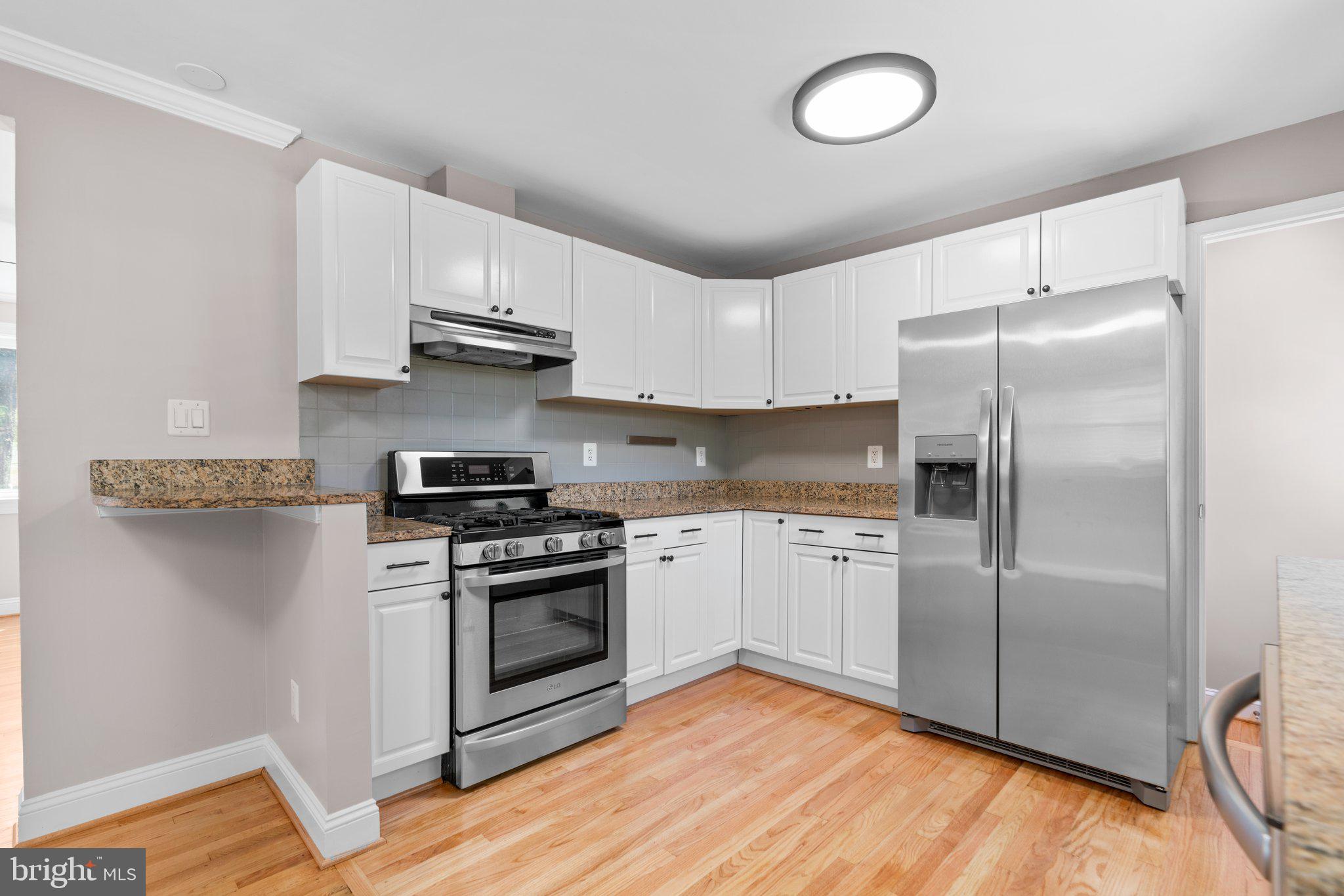 4815 Topping Road Rockville, MD 20852 - Photo 3 of 21 kitchen- brand new fridge and dishwasher