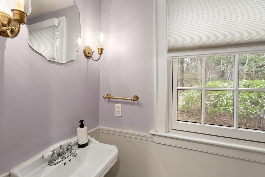 92 Goodnow Road Sudbury, MA 01776 - Photo 15 of 37 a bathroom with a sink and a window