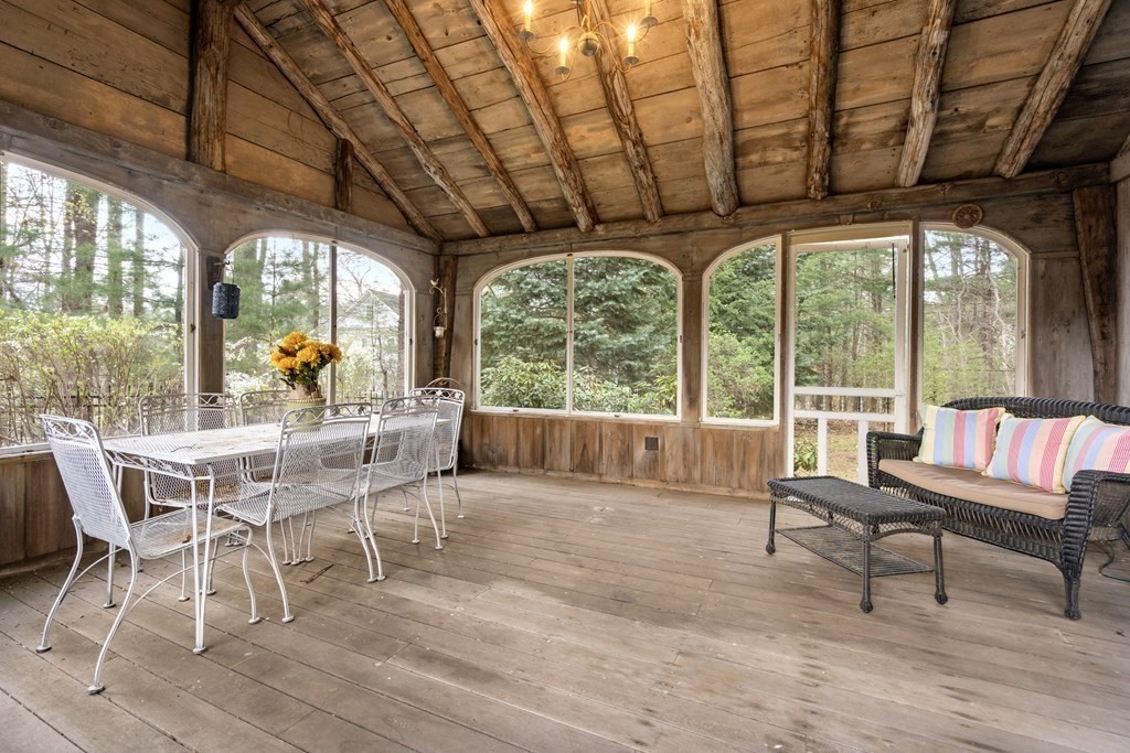 92 Goodnow Road Sudbury, MA 01776 - Photo 21 of 37 a dining room with furniture and wooden floor