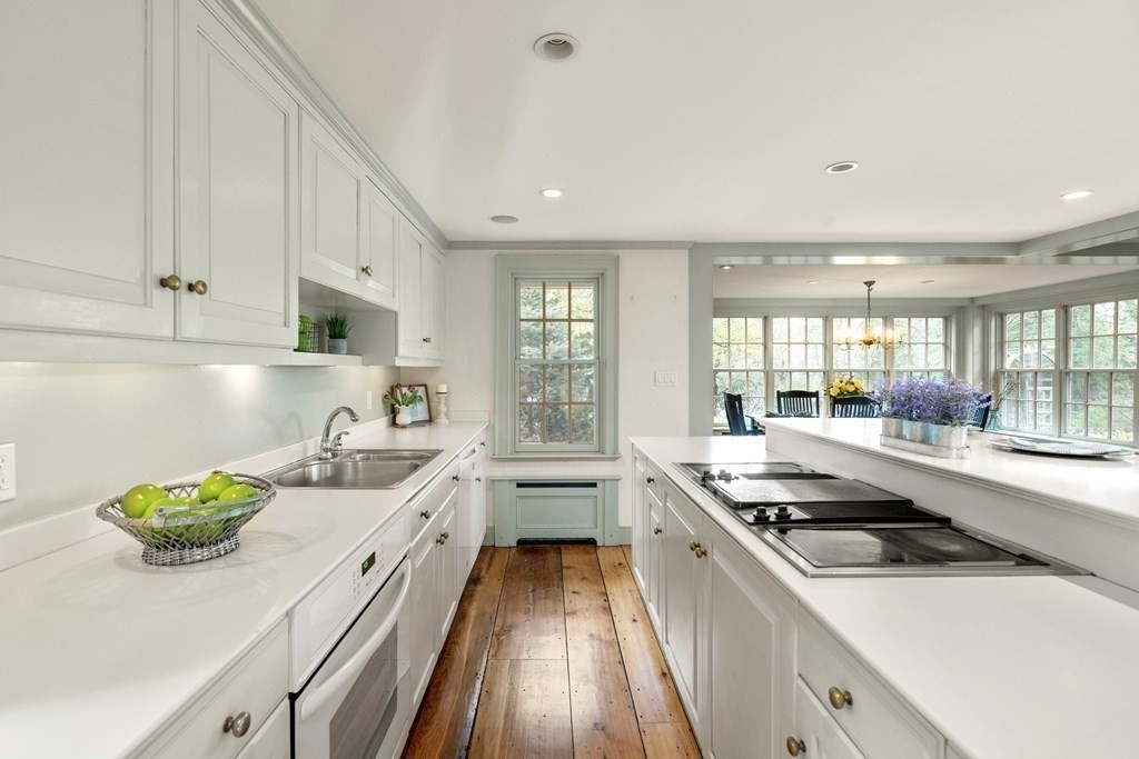 92 Goodnow Road Sudbury, MA 01776 - Photo 7 of 37 a kitchen that has a sink and a stove
