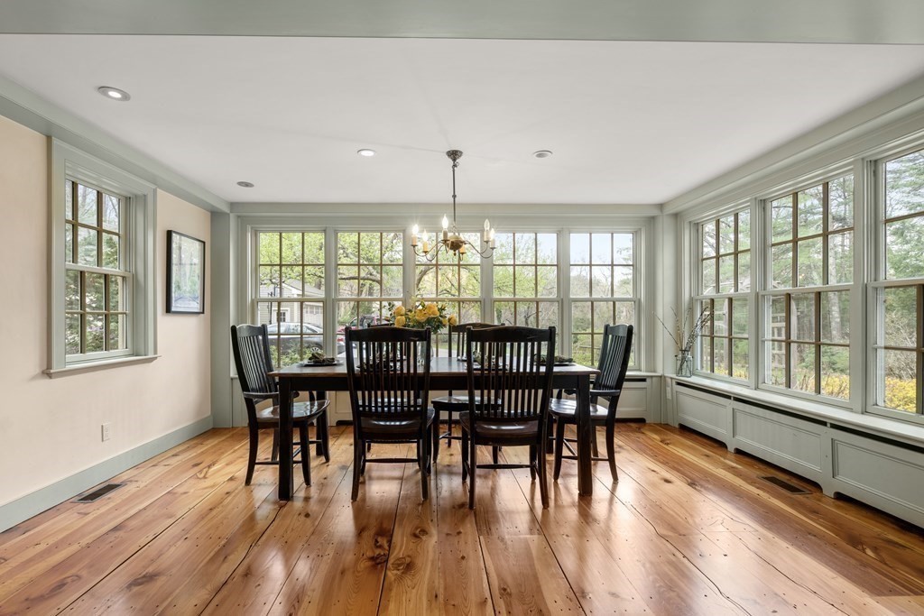 92 Goodnow Road Sudbury, MA 01776 - Photo 8 of 37 a view of a dining room with furniture window and wooden floor
