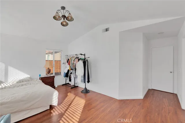 a view of a livingroom with wooden floor