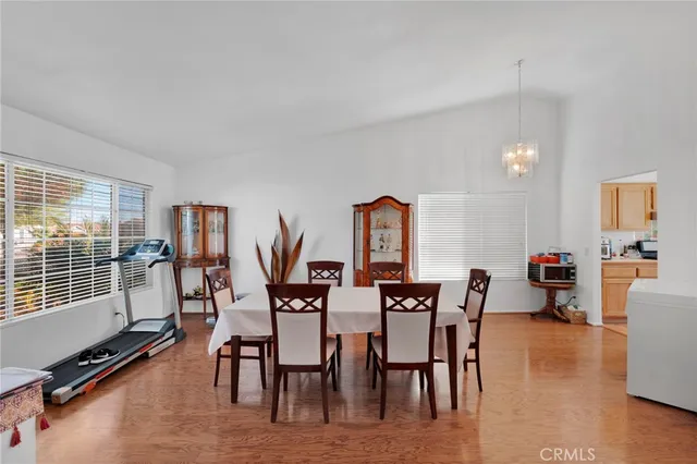 a view of a dining room with furniture window and outside view