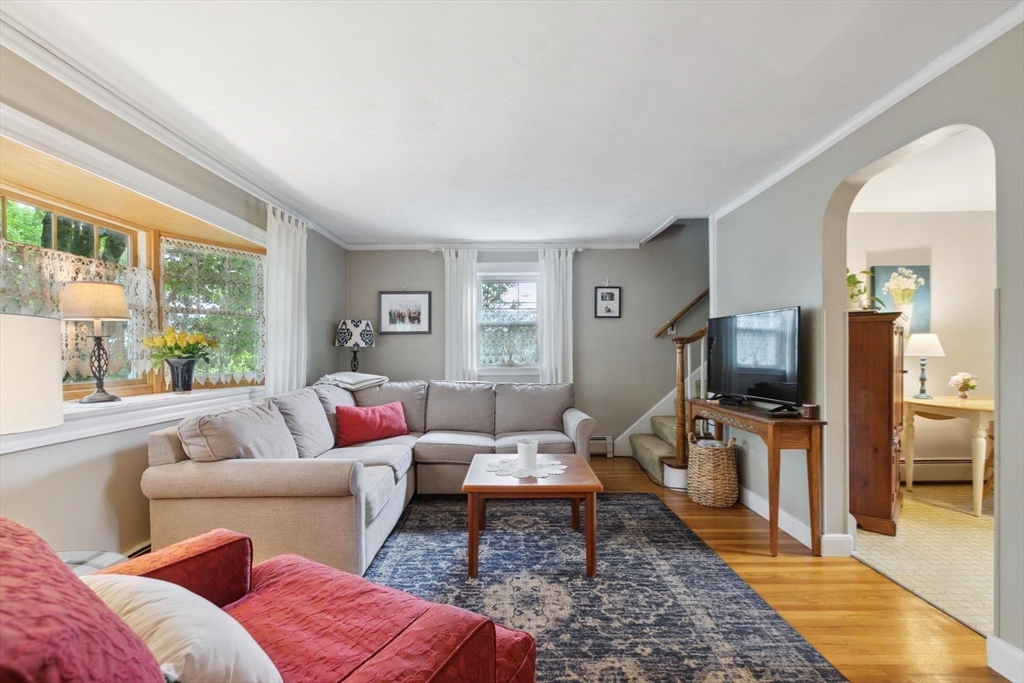 8 Dodge Street Arlington, MA 02474 - Photo 11 of 36 a living room with furniture and a flat screen tv