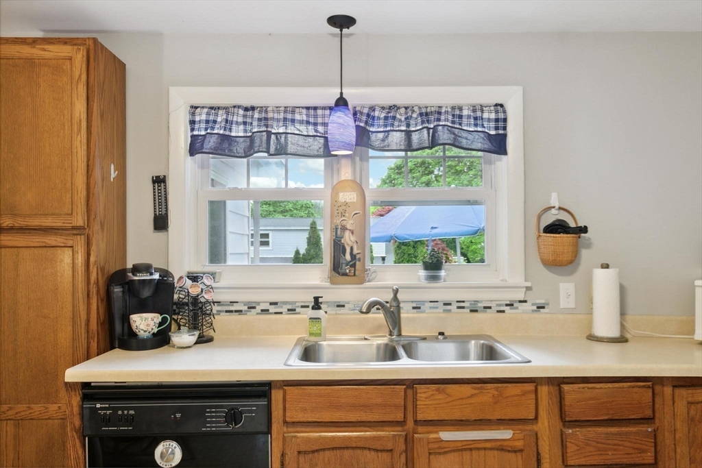 8 Dodge Street Arlington, MA 02474 - Photo 14 of 36 a bathroom with a sink and a window