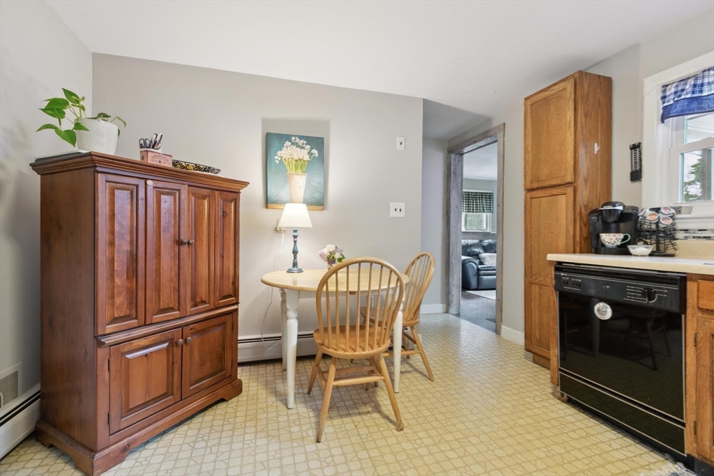 8 Dodge Street Arlington, MA 02474 - Photo 15 of 36 a view of kitchen with furniture and large windows