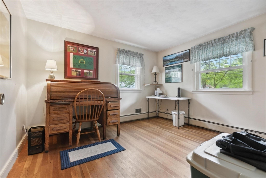 8 Dodge Street Arlington, MA 02474 - Photo 20 of 36 a living room with furniture and a wooden floor