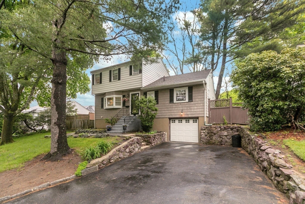 8 Dodge Street Arlington, MA 02474 - Photo 3 of 36 front view of a house with a yard