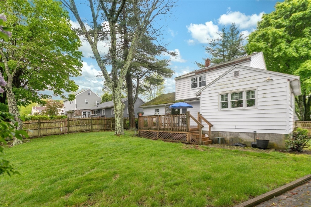 8 Dodge Street Arlington, MA 02474 - Photo 31 of 36 a view of a house with a yard