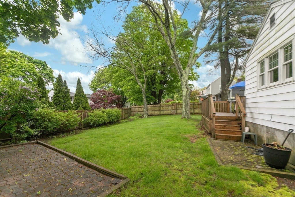 8 Dodge Street Arlington, MA 02474 - Photo 33 of 36 a view of a backyard with sitting area