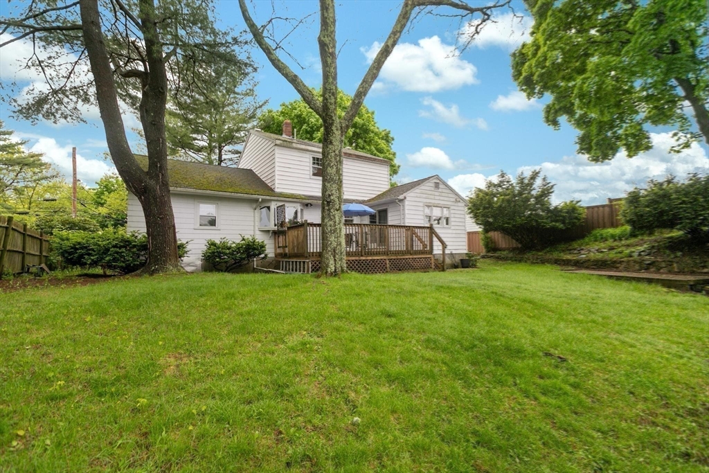 8 Dodge Street Arlington, MA 02474 - Photo 34 of 36 a view of a house with backyard and garden