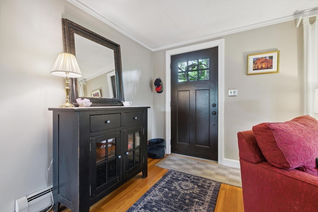 8 Dodge Street Arlington, MA 02474 - Photo 8 of 36 a living room with furniture and a fireplace