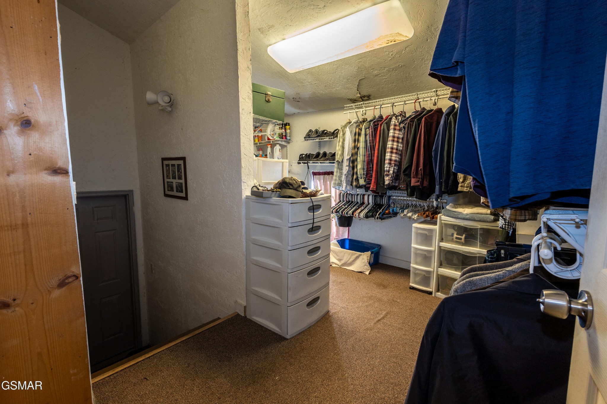 810 Snapdragon Road Sevierville, TN 37876 - Photo 9 of 17 a view of walk in closet with clothes and shoes
