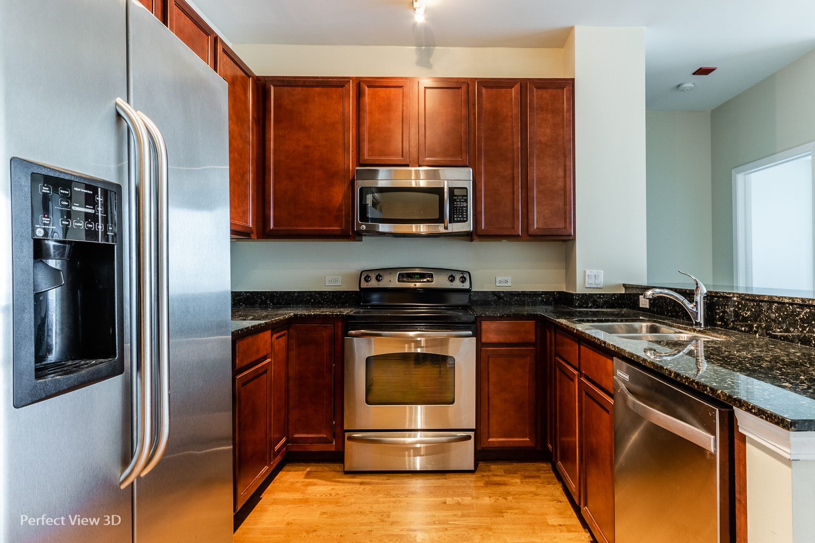 1629 South Prairie Avenue, Unit 2010 Chicago, IL 60616 - Photo 11 of 20 a kitchen with a stove microwave and sink