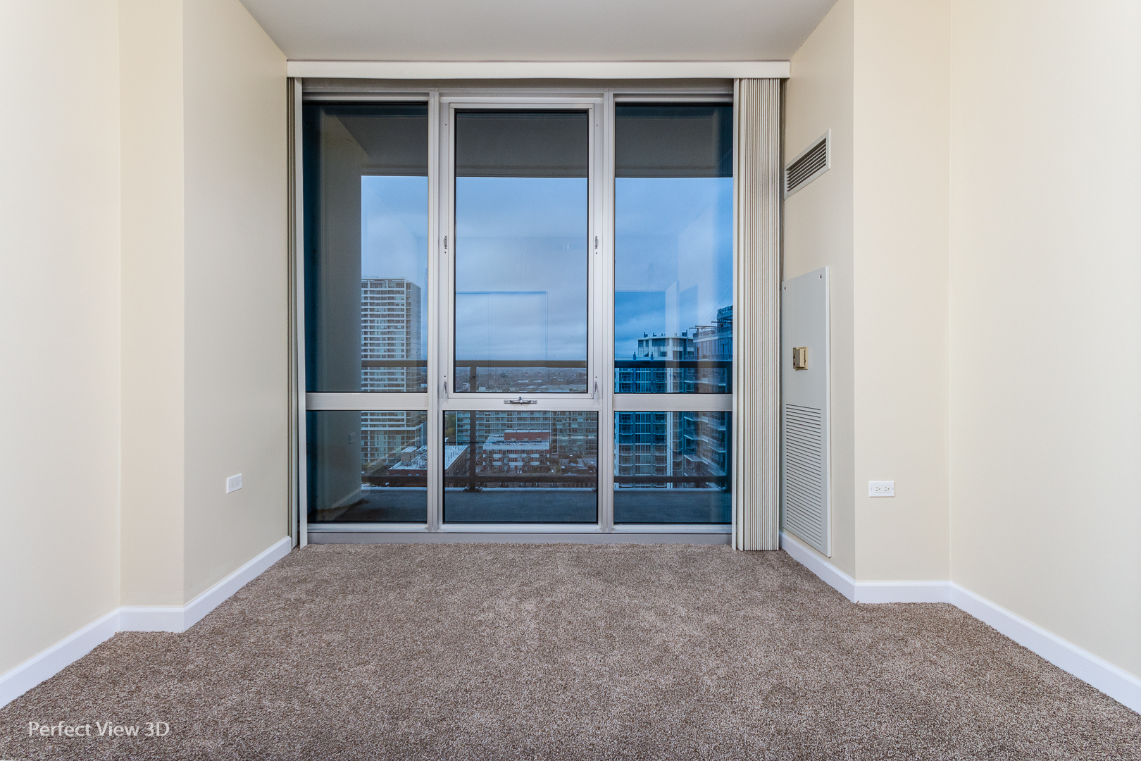 1629 South Prairie Avenue, Unit 2010 Chicago, IL 60616 - Photo 4 of 20 a view of an empty room with a window