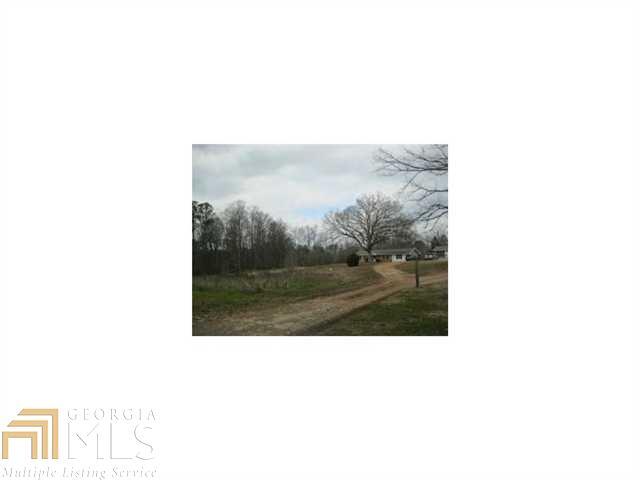 205 Cox Road Roswell, GA 30075 - Photo 1 of 1 Cox rd Frontage over 200' and 159' of road frontage on Hwy 140.