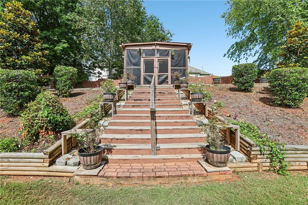 810 Freedom Way Cumming, GA 30040 - Photo 45 of 61 a view of a house with backyard