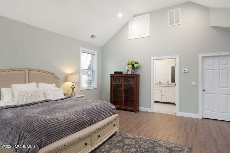 63 Carpenter Street Red Bank, NJ 07701 - Photo 21 of 35 a bedroom with a bed and a closet