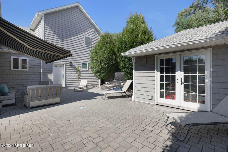 63 Carpenter Street Red Bank, NJ 07701 - Photo 30 of 35 a backyard of a house with yard and seating space