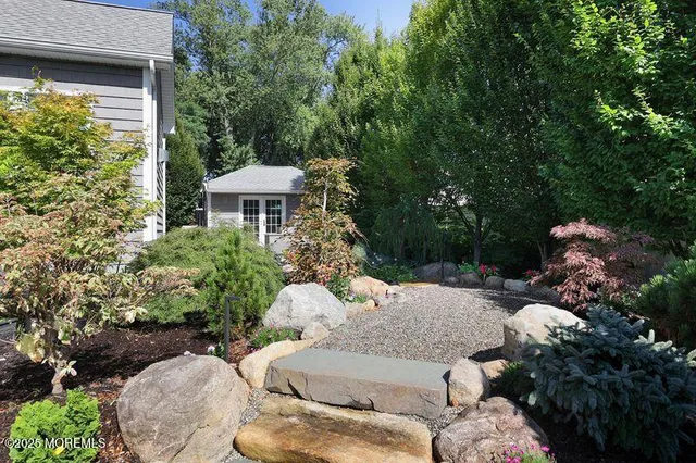 a view of a patio in backyard