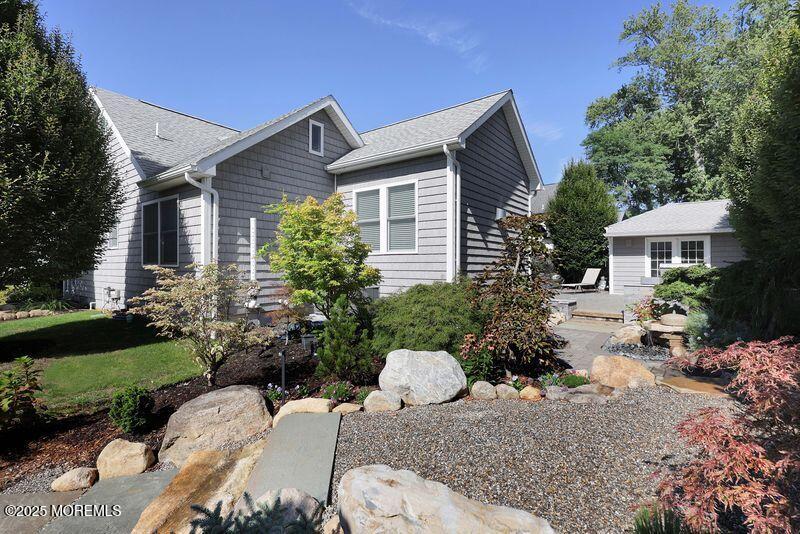 63 Carpenter Street Red Bank, NJ 07701 - Photo 34 of 35 a view of a house with a yard and sitting area