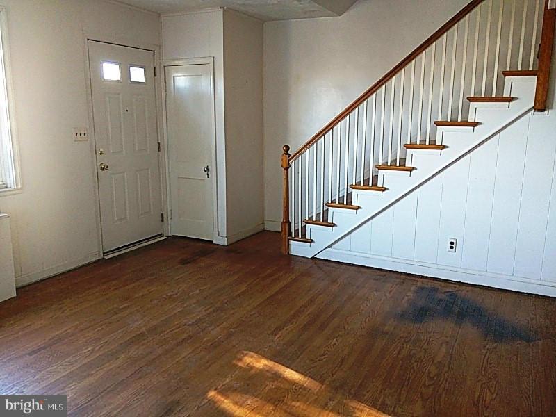 842 Braeside Road Baltimore, MD 21229 - Photo 8 of 26 a view of entryway with wooden floor