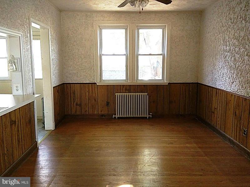 842 Braeside Road Baltimore, MD 21229 - Photo 10 of 26 a view of an empty room with a window