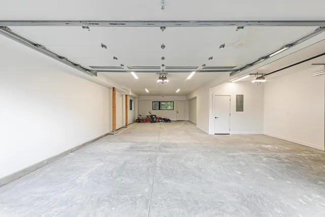 a view of a livingroom with furniture and chandelier