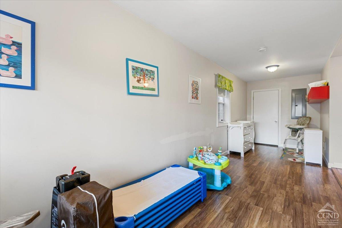 479 Main Street Cairo, NY 12413 - Photo 30 of 40 a living room with furniture and a wooden floor