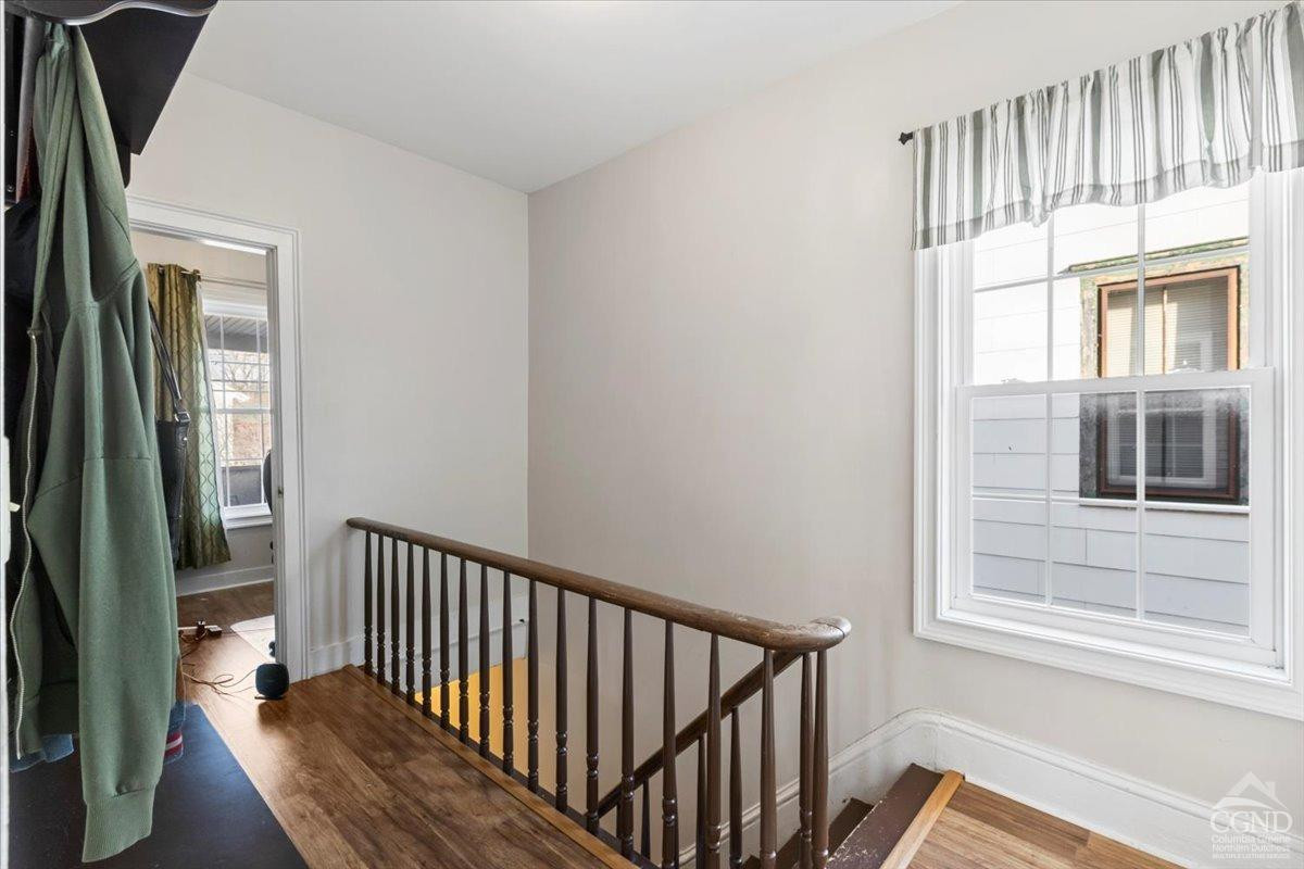 479 Main Street Cairo, NY 12413 - Photo 9 of 40 a view of staircase with wooden floor and a window