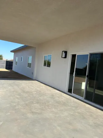 a bedroom with a bed and a cabinets