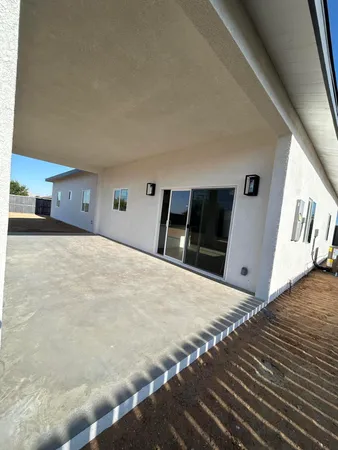 a kitchen with kitchen island microwave and cabinets