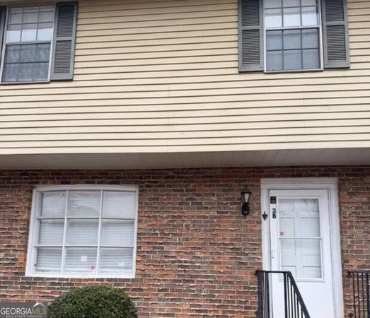 a front view of a house with a window