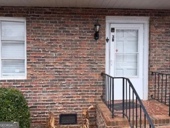 a brick building with a window