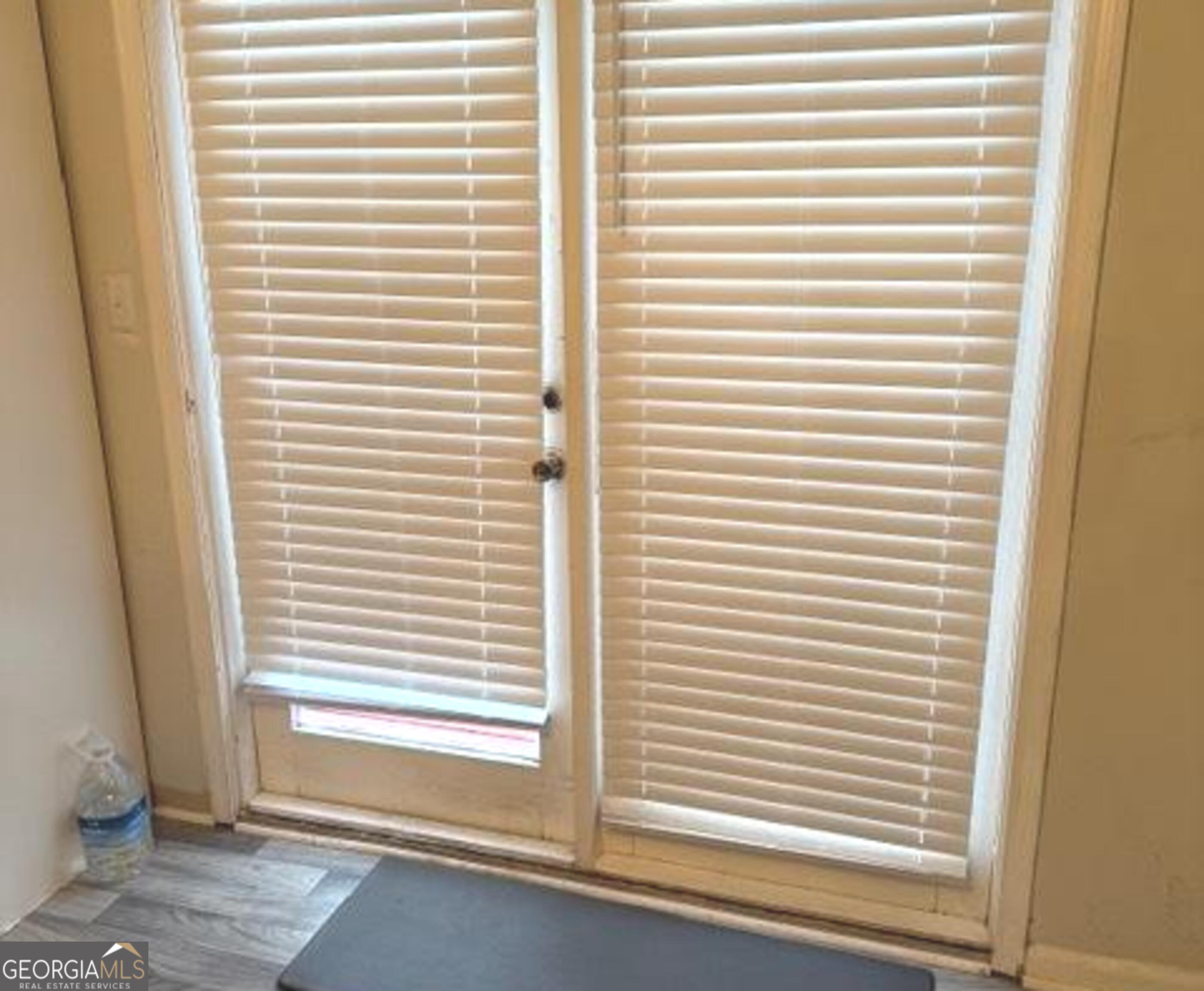 501 Carlton Road, Unit 3B Palmetto, GA 30268 - Photo 22 of 25 a view of a room that has a window in it