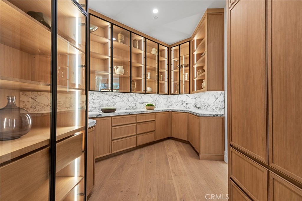 5373 Jed Smith Road Hidden Hills, CA 91302 - Photo 13 of 44 a kitchen with stainless steel appliances granite countertop a sink and cabinets