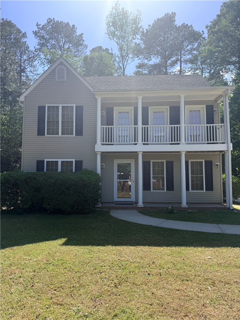 613 Brock Street Central, SC 29630 - Photo 1 of 1 This charming home offers a welcoming facade with a balcony and classic architectural details.