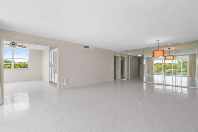 a bathroom with a sink vanity and a mirror