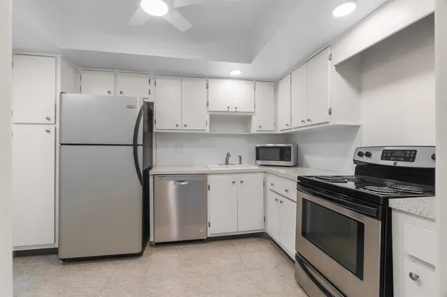 a view of a lake with a nearby beach