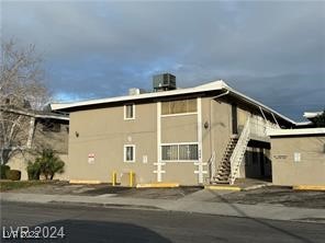 304 Orland Street, Unit 39 Las Vegas, NV 89107 - Photo 2 of 15 View of building exterior featuring stairway and c