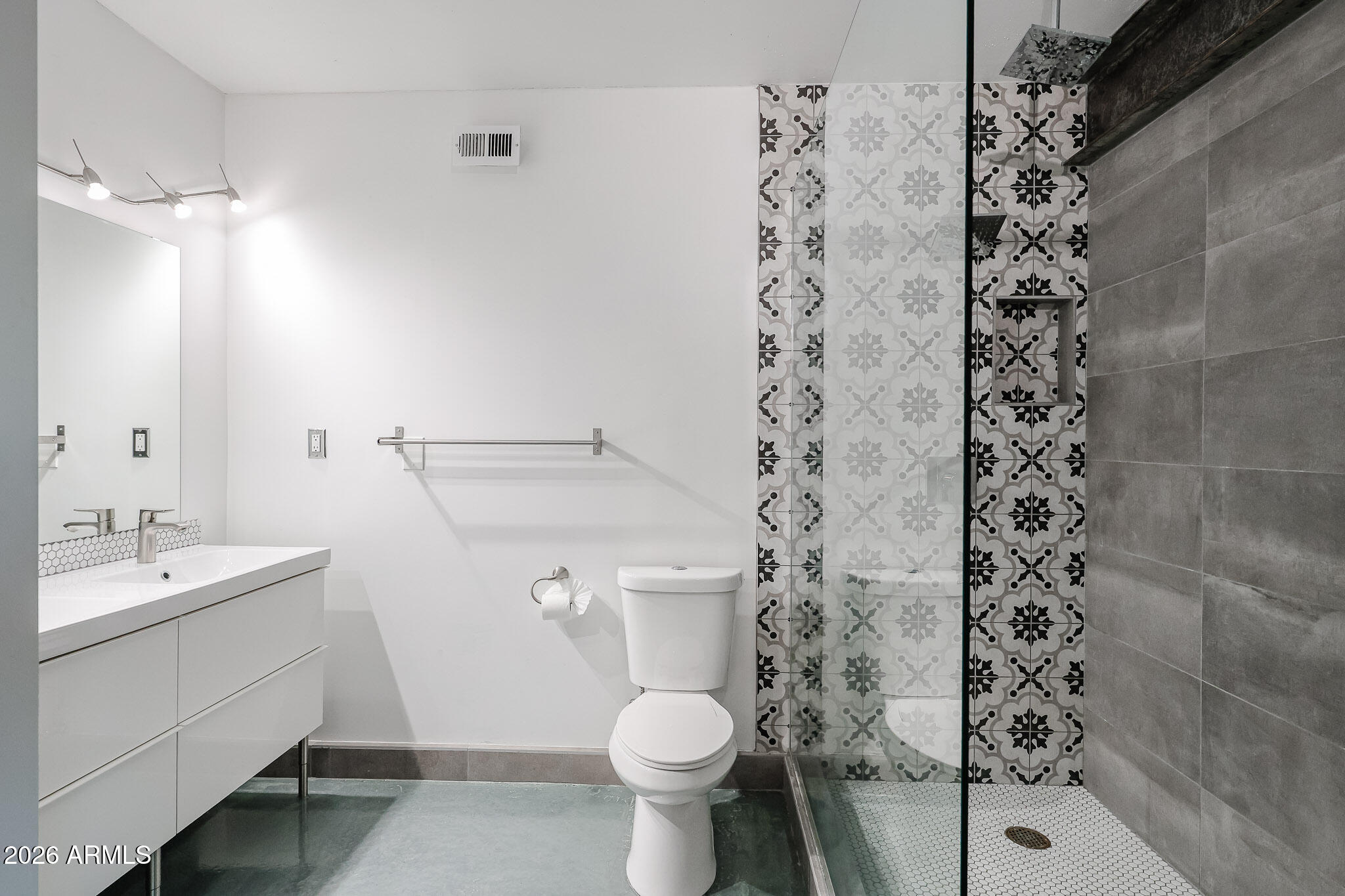 353 East Thomas Road, Unit C501 Phoenix, AZ 85004 - Photo 49 of 53 a bathroom with a sink toilet and shower