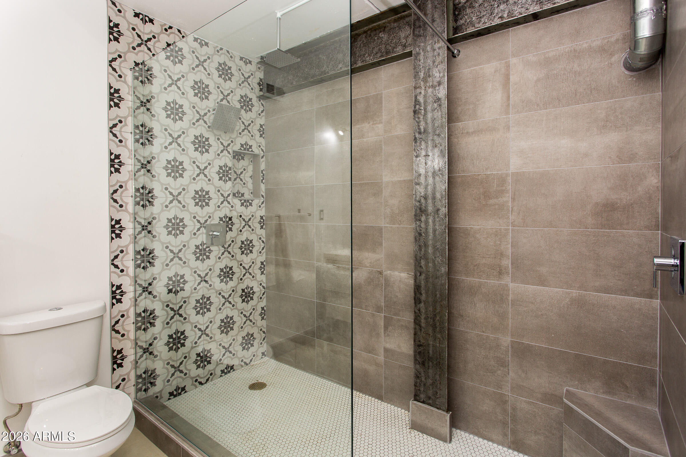 353 East Thomas Road, Unit C501 Phoenix, AZ 85004 - Photo 7 of 53 a bathroom with a shower toilet and sink