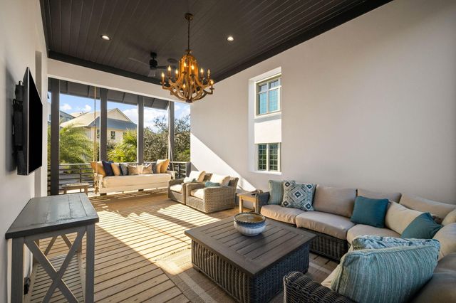 a view of entryway with wooden floor and staircase