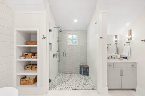 a bedroom with bed and window