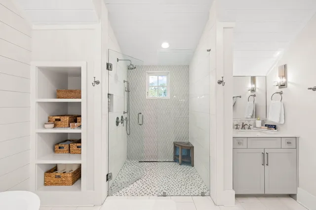 a bedroom with bed and window