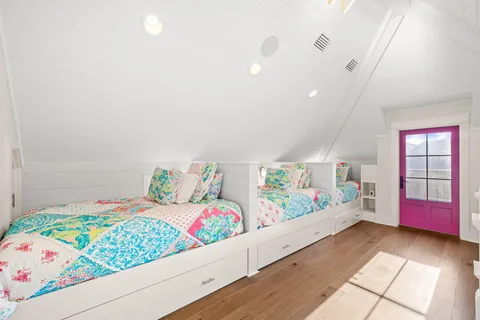 a very nice looking room with a white furniture